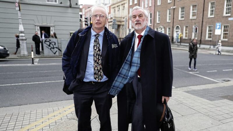 Sport Ireland CEO John Treacy, left, and chairman Kieran Mulvey arrive at Leinster House to appear before a Sport Committee regarding funding to the Football Association of Ireland on Wednesday. Picture by Brian Lawless, Press Association 