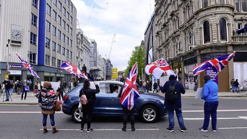 Members of Unionists Against NI Protocol during a white line protest outside the City Hall in Belfast on Saturday. Picture by Arthur Allison, Pacemaker 