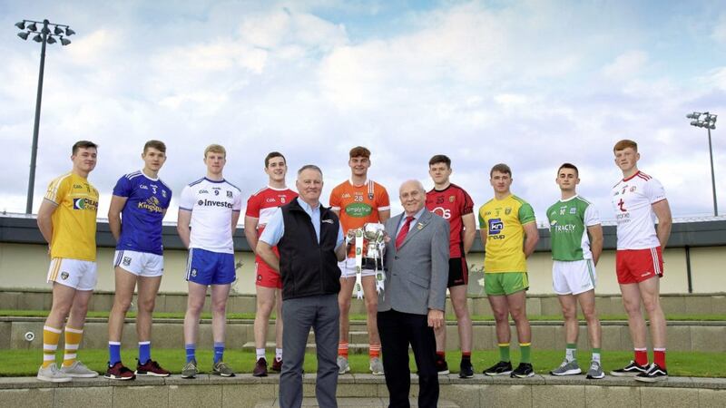 Eirgrid Ulster Under 20 Football Championship 2019 launch at Garvaghey: Fergal Keenan (left) from Eirgrid and Oliver Galligan (Ulster GAA president), with team captains from each county. Picture by Cliff Donaldson 
