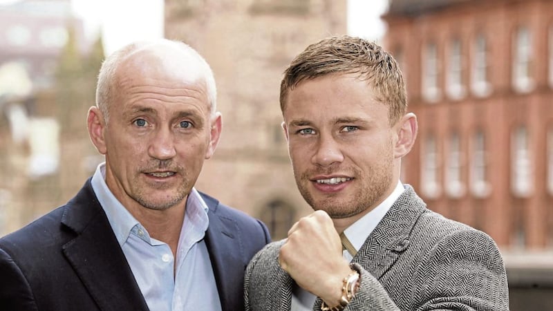 Boxer Carl Frampton and Barry McGuigan  pictured in Belfast before the boxer left Cyclone Promotions. Picture Hugh Russell.