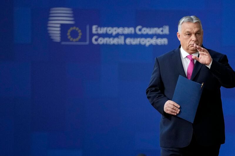 Hungary’s Prime Minister Viktor Orban arrives for an EU summit at the European Council building in Brussels (Virginia Mayo/AP)