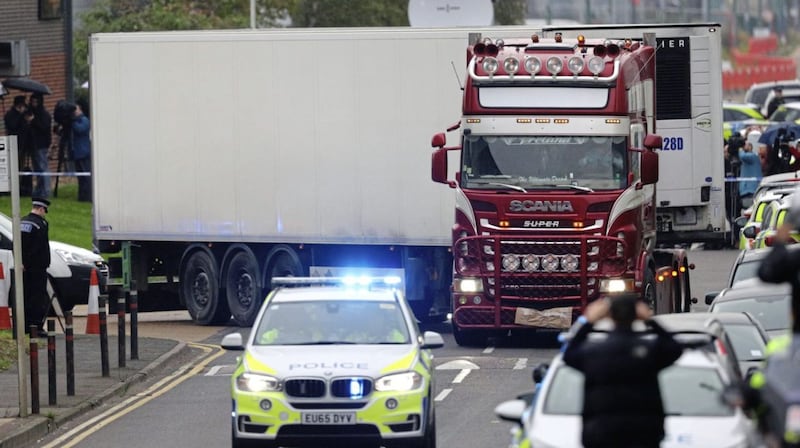 Maurice 'Mo' Robinson's container lorry, in which 39 people were found dead, being driven away by police from Waterglade Industrial Park in Grays, Essex