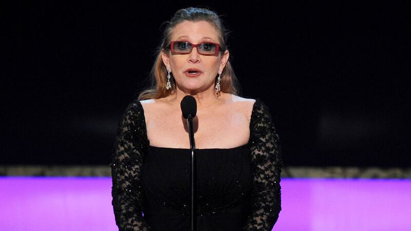 Actress Carrie Fisher presents the life achievement award on stage at the 21st annual Screen Actors Guild Awards at the Shrine Auditorium in Los Angeles in 2015. Picture by Vince Bucci, Invision/Associated Press&nbsp;