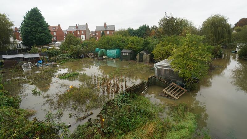 Debris and floodwater in allotments in Retford, Nottinghamshire, in October (Jacob King/PA)