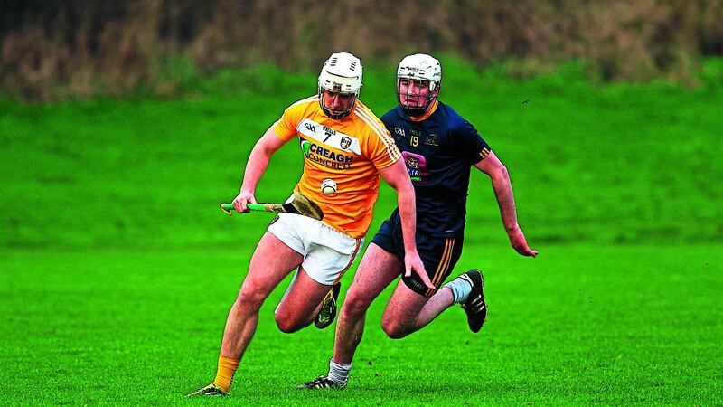 <strong>&nbsp;A MATTER OF CONOR</strong>: Antrim&rsquo;s Conor McKinley gets away from Billy Hanlon of DCU during yesterday&rsquo;s Walsh Cup clash at Jordanstown which the Saffrons won by nine points. Picture by Seamus Loughran