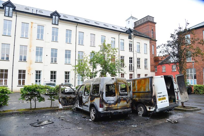 The vans targeted in an early morning arson attack at the Barn Mills complex in Carrickfergus. Picture by Arthur Allison/Pacemaker Press.