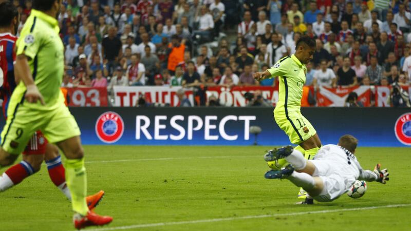 Barcelona's Neymar levels the scores despite the despairing lunge of Bayern 'keeper Manuel Neuer in Wednesday's Champions League semi-final <br />Picture: PA