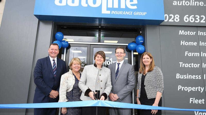 First Minister Arlene Foster opens the Autoline Enniskillen office watched by (from left) Autoline's Michael Blaney (managing director), Caroline Currie (sales director), Richard Henderson (branch manager) and Julie Gibbons (operations director). Picture by Andrew Paton, Press Eye