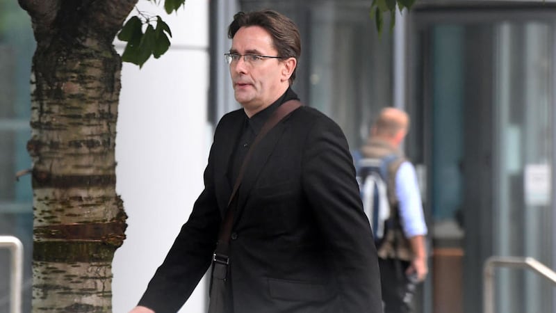 Peter Gilroy leaving Belfast Laganside court 