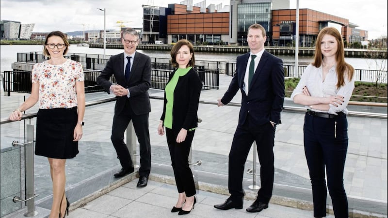 Law firm Carson McDowell has expanded its corporate team in response to increased demand for the team&rsquo;s expertise from local and international clients. Pictured (from left) are Rosanne Brennan (associate), Richard Gray and Neasa Quigley (joint heads of the corporate team), Paul McGuickin (senior associate) and Helen Boyle (solicitor). Photo: Elaine Hill 
