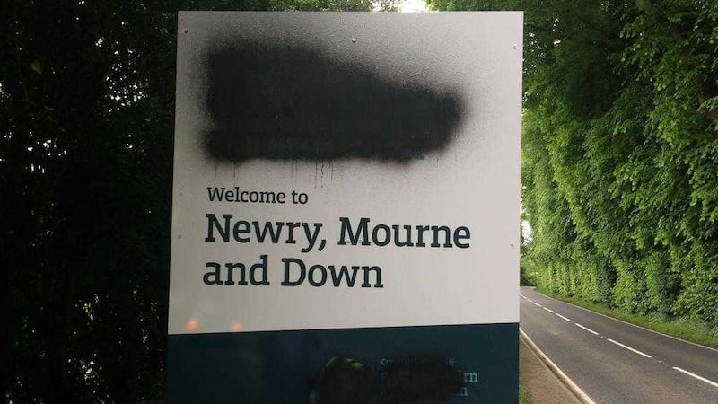 Irish language council signs on the Ballyward Road, near Castlewellan, Co Down, have been defaced 