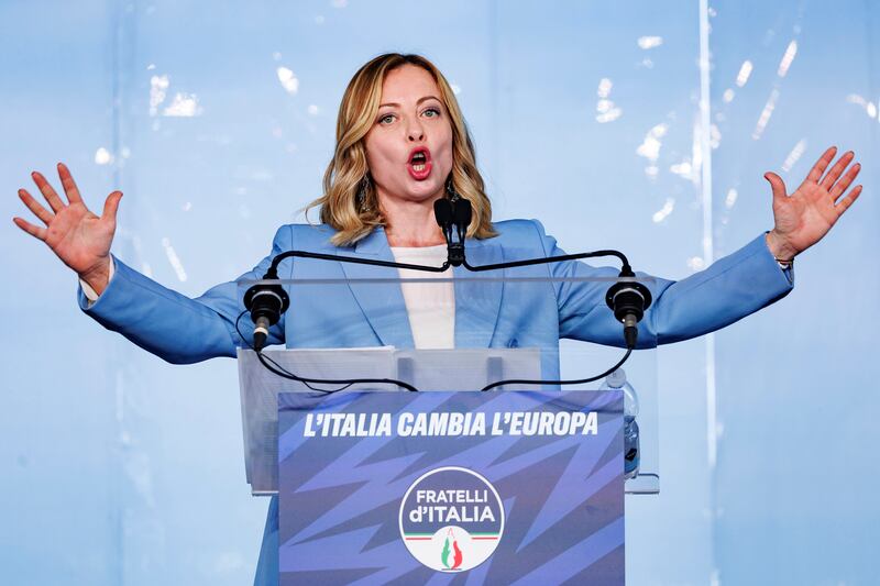 Italian Prime Minister Giorgia Meloni speaks on the last of a three-day Brothers of Italy party conference ahead of the June elections for the European Parliament, in Pescara (LaPresse via AP)