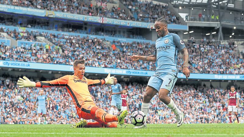 &nbsp;Raheem Sterling goes round West Ham goalkeeper Adrian to score his second and Man City&rsquo;s third goal in their 3-1 win over the Hammers at the Etihad yesterday<br />  Picture by PA