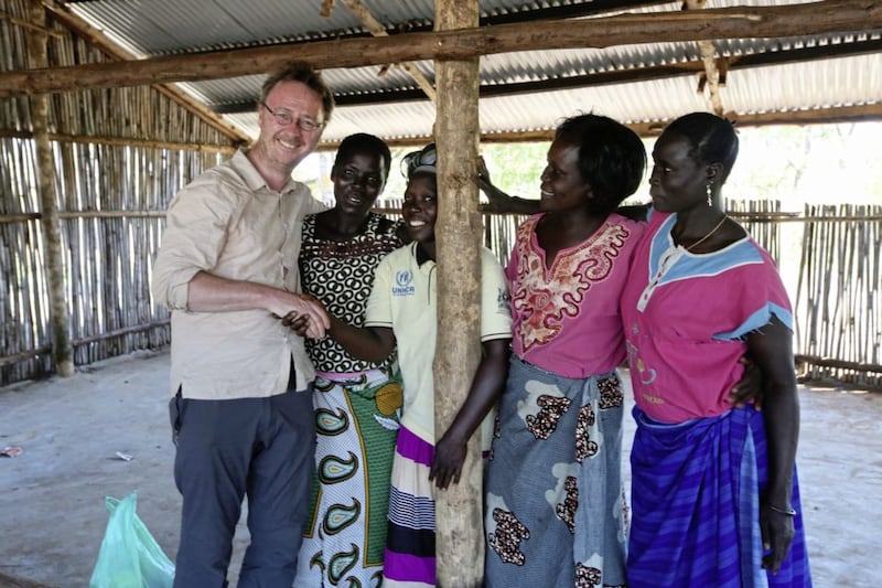 Tony Bailie with members of the Palabek refugee camp Child Protection Committee  