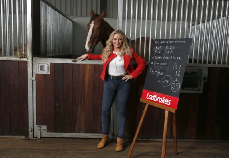  Carol Vorderman unveils her formula, which she created for bookmaker Ladbrokes, to help punters pick a horse to back for the nation's favourite race Ð the Grand National this weekend, at Ladbrokes in Bristol. 
