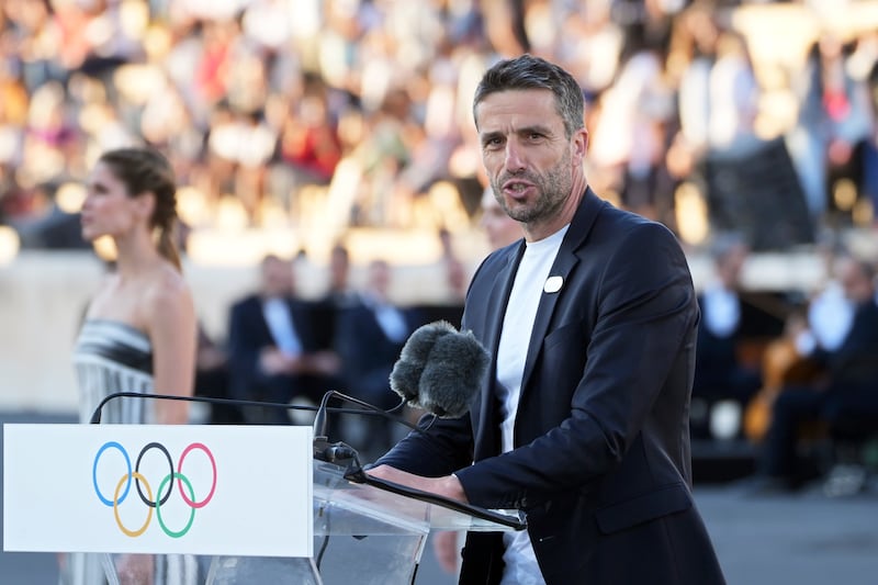Tony Estanguet, president of Paris 2024, delivers a speech during the Olympic flame handover ceremony (Petros Giannakouris/AP)
