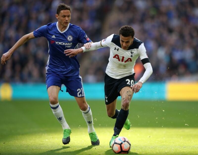 Chelsea's Nemanja Matic (left) and Tottenham Hotspur's Dele Alli battle for the ball 