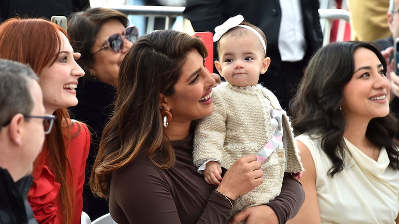 Malti Marie Chopra Jonas smiled along with her mother on Monday, as her father was honoured with a star on the Hollywood Walk Of Fame.