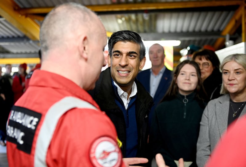 Prime Minister Rishi Sunak during a visit to Air Ambulance Northern Ireland at its headquarters in Lisburn