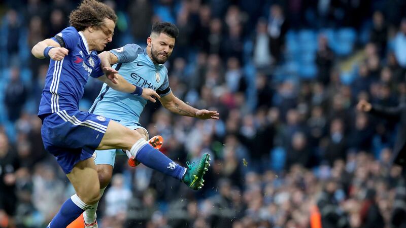 &nbsp;Manchester City's Sergio Aguero (right) fouls Chelsea's David Luiz (centre) before being sent-off during yesterday's match at the Ethiad Stadium. Pictures by PA