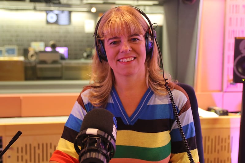 Claudia Hammond sitting in a radio station