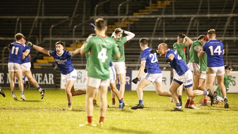 Naomh Conaill players celebrate their last-gasp winning goal against Gowna. 