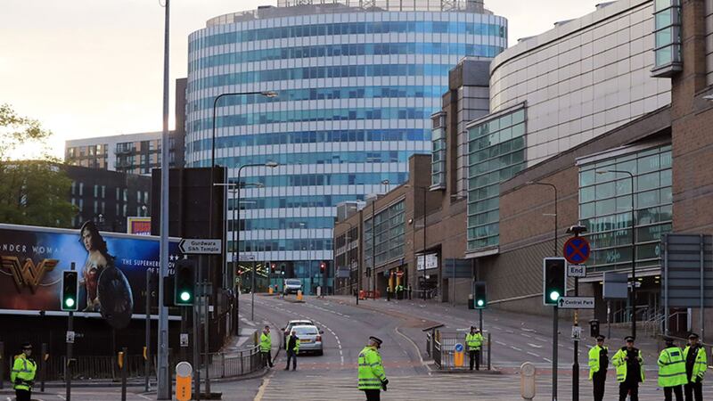 Police patrol outside the Manchester Arena the morning after a suspected terrorist attack at the end of a concert by US star Ariana Grande left 22 dead&nbsp;