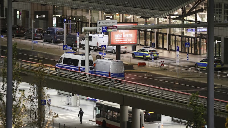 Police vehicles block access to Hamburg airport (Bodo Marks/dpa/AP)