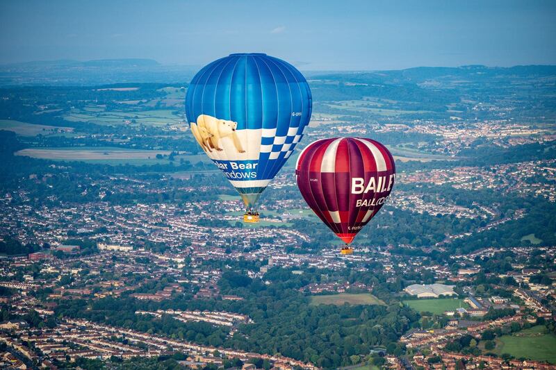 Balloons slowly floated over north Bristol (Ben Birchall/PA)