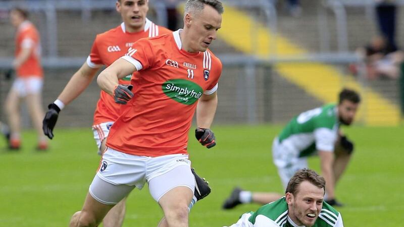 LOTS ON THE LINE: Fermanagh&#39;s Declan McCusker and Armagh&#39;s Mark Shields will be chasing what is a huge two points at Brewster Park for both sides. Picture: Philip Walsh 