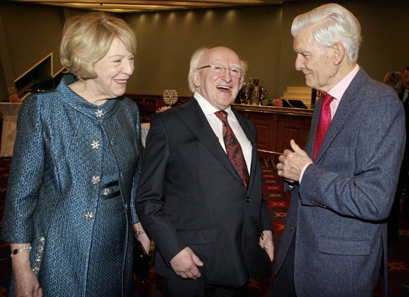 President Michael D Higgins His wife, Sabina Coyne and chairman of the Irish News Jim Fitzpatrick share a laugh at Saturday nights gala dinner in Belfast during the annual Seachtain na Gaeilge (Irish language Week) celebrations. PICTURE MATT BOHILL.. 