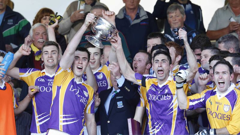 Derrygonnelly's Ryan Jones and Garvan McGinley lift the New York Cup on Sunday<br/>Picture: Donnie Phair&nbsp;