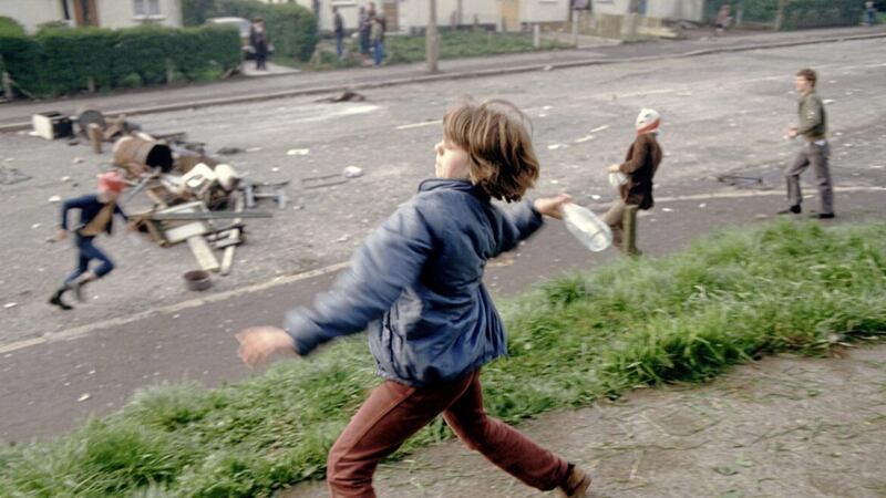 Young rioters during a 1981 march in west Belfast in support of Bobby Sands. Picture by Peter Marlow/Magnum Photos 
