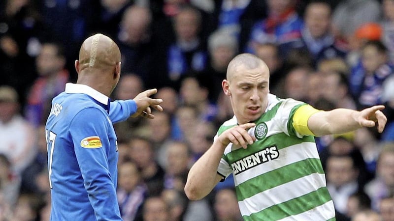 Scott Brown celebrates scoring his sides second goal in front of El-Hadj Diouf during the 2011 Scottish Cup Fifth Round match at Ibrox Stadium Glasgow. Picture by Andrew Milligan/PA 