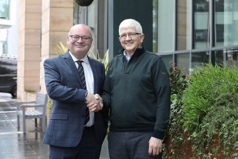 Michael Kelly with the charity’s interim national director Harry Casey. PICTURE: JOHN MCELROY
