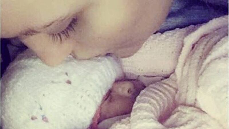 Erin O&#39;Hara kisses her daughter Freya Anne who died two minutes after birth 