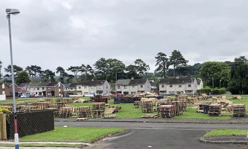 Pallets being collected at a bonfire site in Ballycraigy estate, Antrim 
