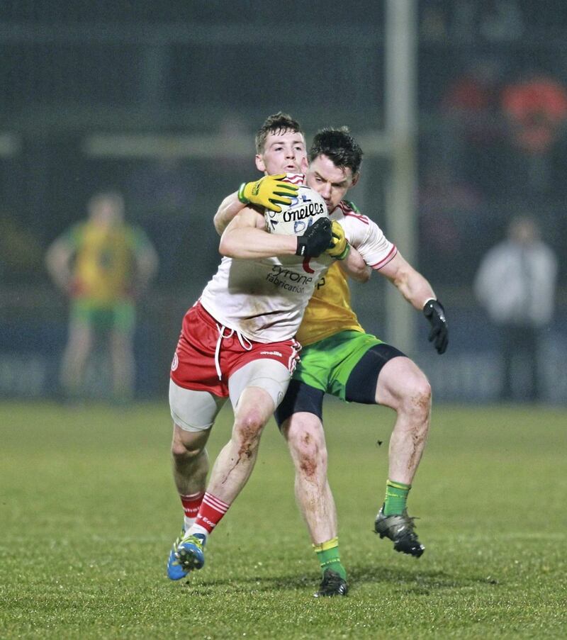 10/03/2018: Tyrone Mattie Donnelly with Jamie Brennan of Donegal during Saturday nights NFL match at Healy Park Omagh. Picture Margaret McLaughlin. 