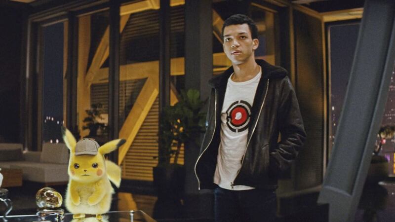 Pikachu (voiced by Ryan Reynolds) and Justice Smith as Tim Goodman 