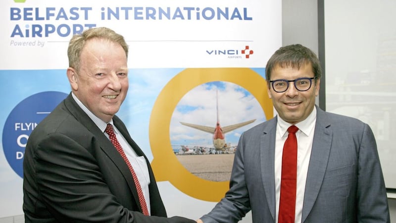 Belfast International Airport chief Graham Keddie (left) welcomes Vinci Concessions chief executive Nicolas Notebaert to Aldergrove yesterday as the airport&#39;s new branding was unveiled 