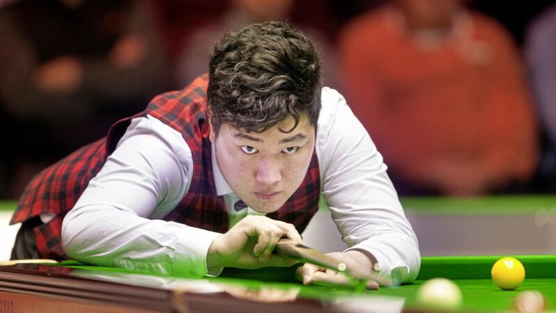 Yan Bingtao, pictured playing in the 2017 Northern Ireland Open snooker final, is one of the Chinese players suspended from the World Snooker Tour amid an ongoing investigation into match-fixing. 