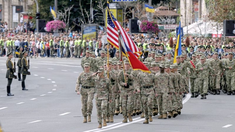 US soldiers march along main Khreshchatyk Street during during a military parade to celebrate Independence Day in Kiev, Ukraine. Picture by Efrem Lukatsky, Associated Press 
