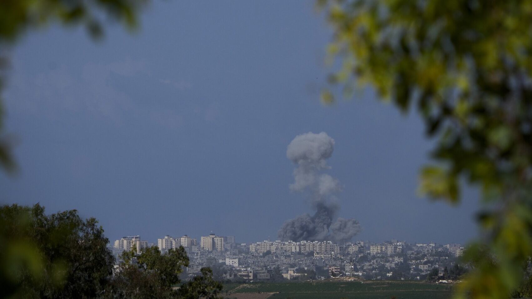 Smoke rises following an Israeli airstrike in the Gaza Strip on Thursday (Maya Alleruzzo/AP)