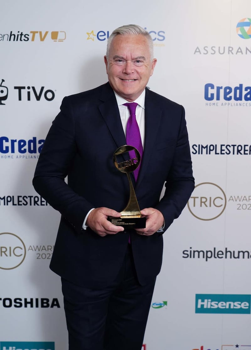 Huw Edwards with the live event award for the state funeral of the late Queen at the Tric Awards at the Grosvenor House Hotel