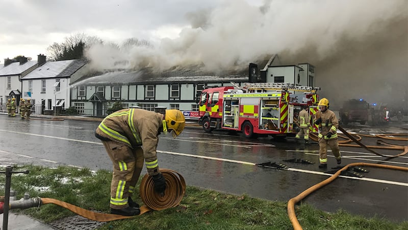 Firefighters deal with the blaze in Dundonald. Picture by Mal McCann.