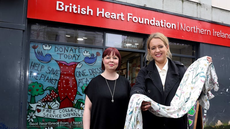 South Belfast MLA Kate Nicholl is pictured donating her Mayoral dress to British Heart Foundation Northern Ireland for the charity’s ‘Reuse Revolution’ campaign. Pictured with Kate is Maureen McElhatton, Area Retail Manager for BHF NI.