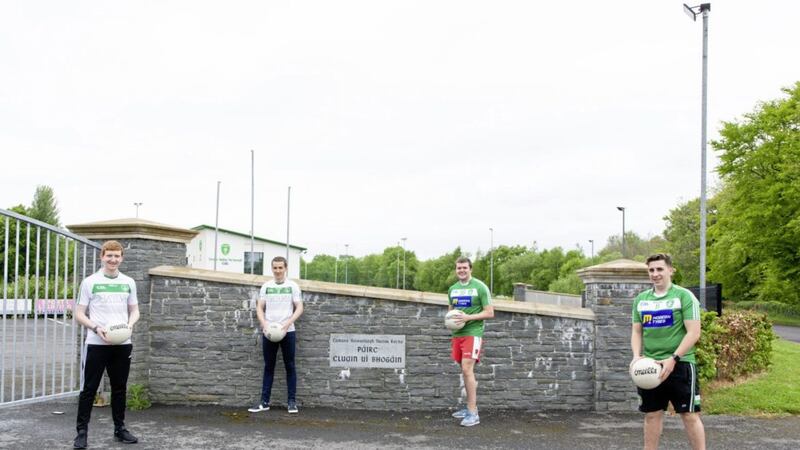 Drumragh Sarsfields senior footballers Eoin McGread, Barry Fitzgerald, Paddy Roche and Ciaran Donaghey outside Clanabogan Park after the completion of the Great Solo Re-Run event that raised more than &pound;9,000 for Trocaire. Picture by Rory Cox. 