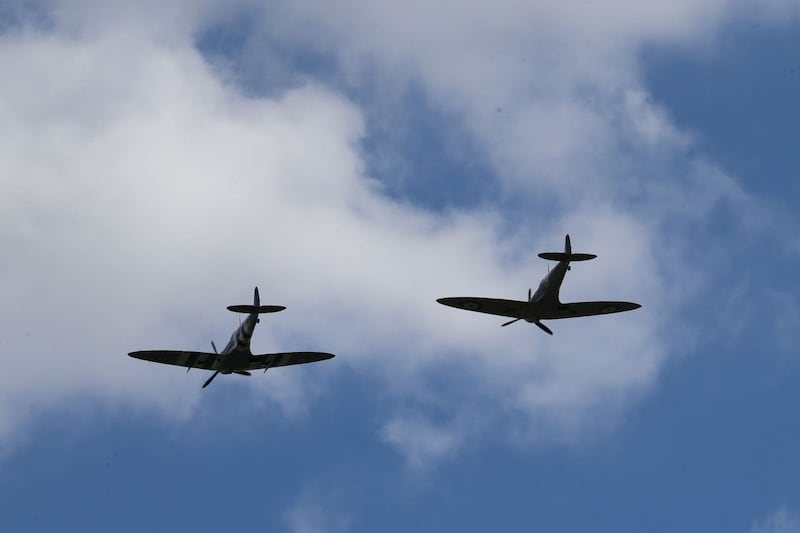 Two spitfires from the Battle of Britain Memorial performed a flypast 