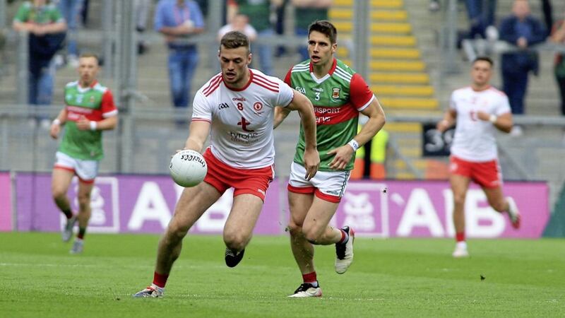 Tyrone's Brian Kennedy moves away from Mayo star Lee Keegan in the 2021 All-Ireland SFC Final at Croke Park. Picture by Seamus Loughran