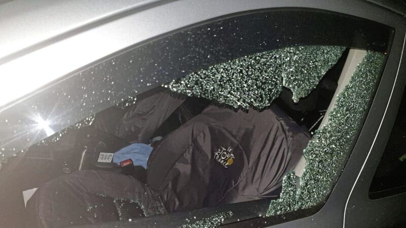 Police have appealed for information after a brick was thrown at the window of a passing car in west Belfast. The vehicle was targeted just before 11.30pm on Friday at the roundabout at Lagmore Avenue. Picture from PSNI West Belfast Facebook 